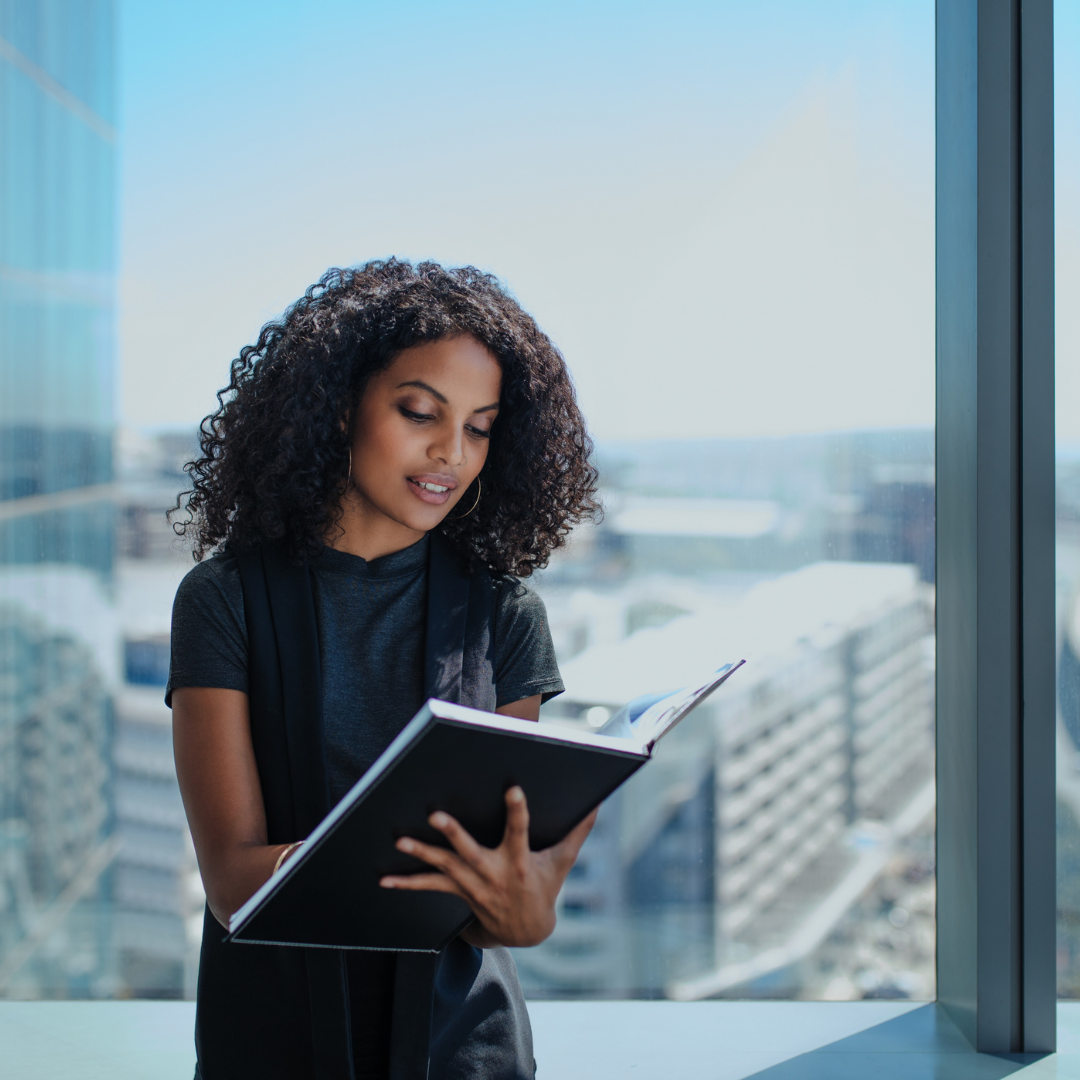Woman with large notebook